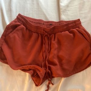 super soft orange drawstring shorts